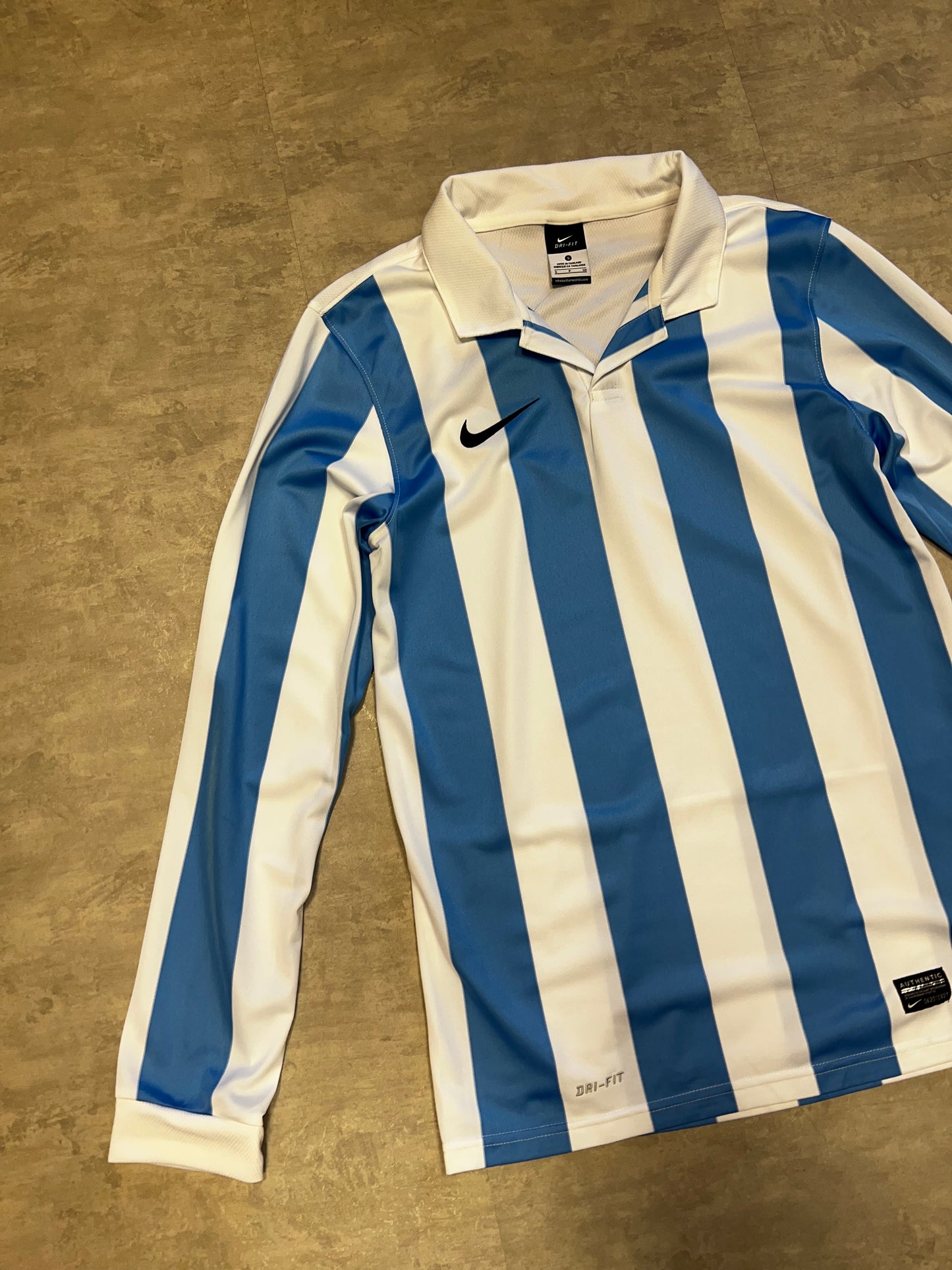 Nike shirt light blue and white long sleeves