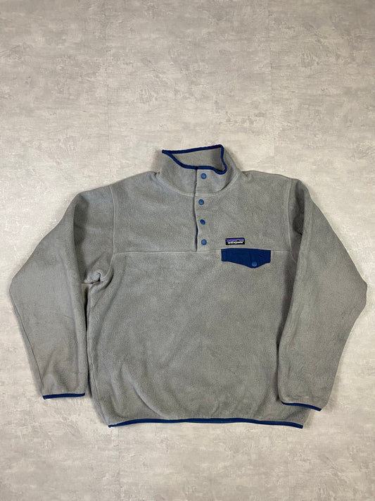 Patagonia fleece front pocket with bottons