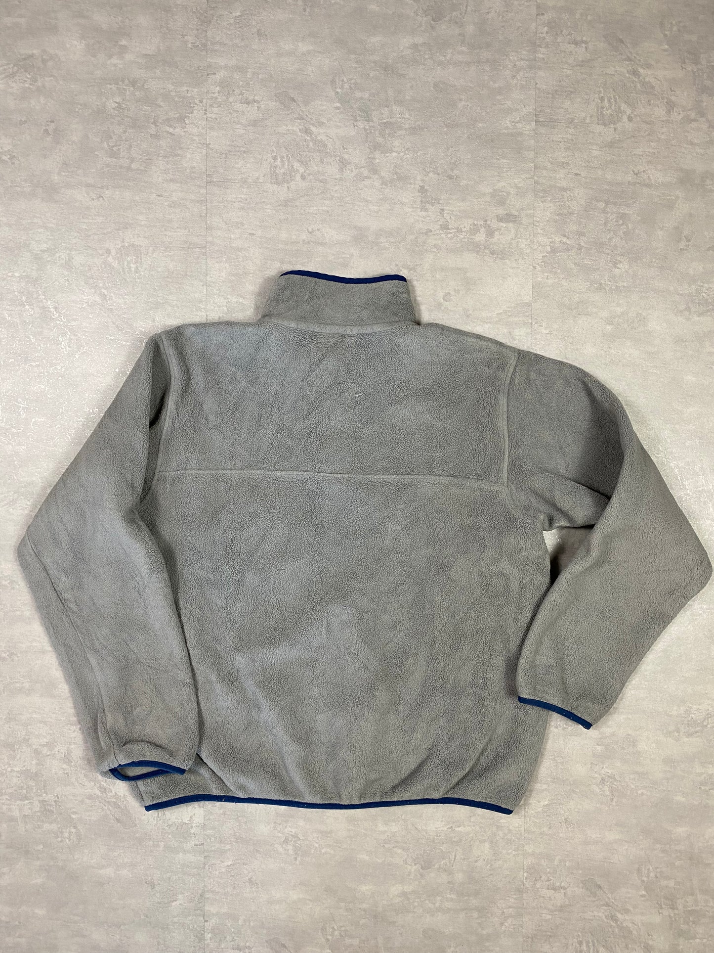 Patagonia fleece front pocket with bottons